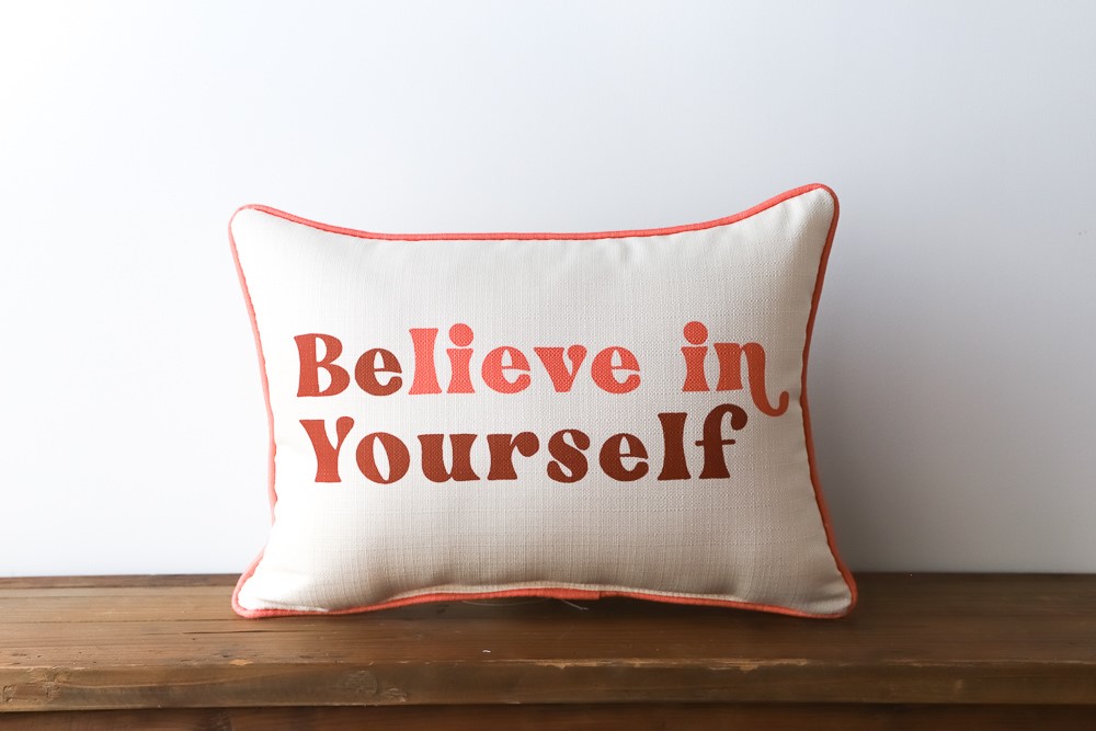 Believe throw outlet pillow